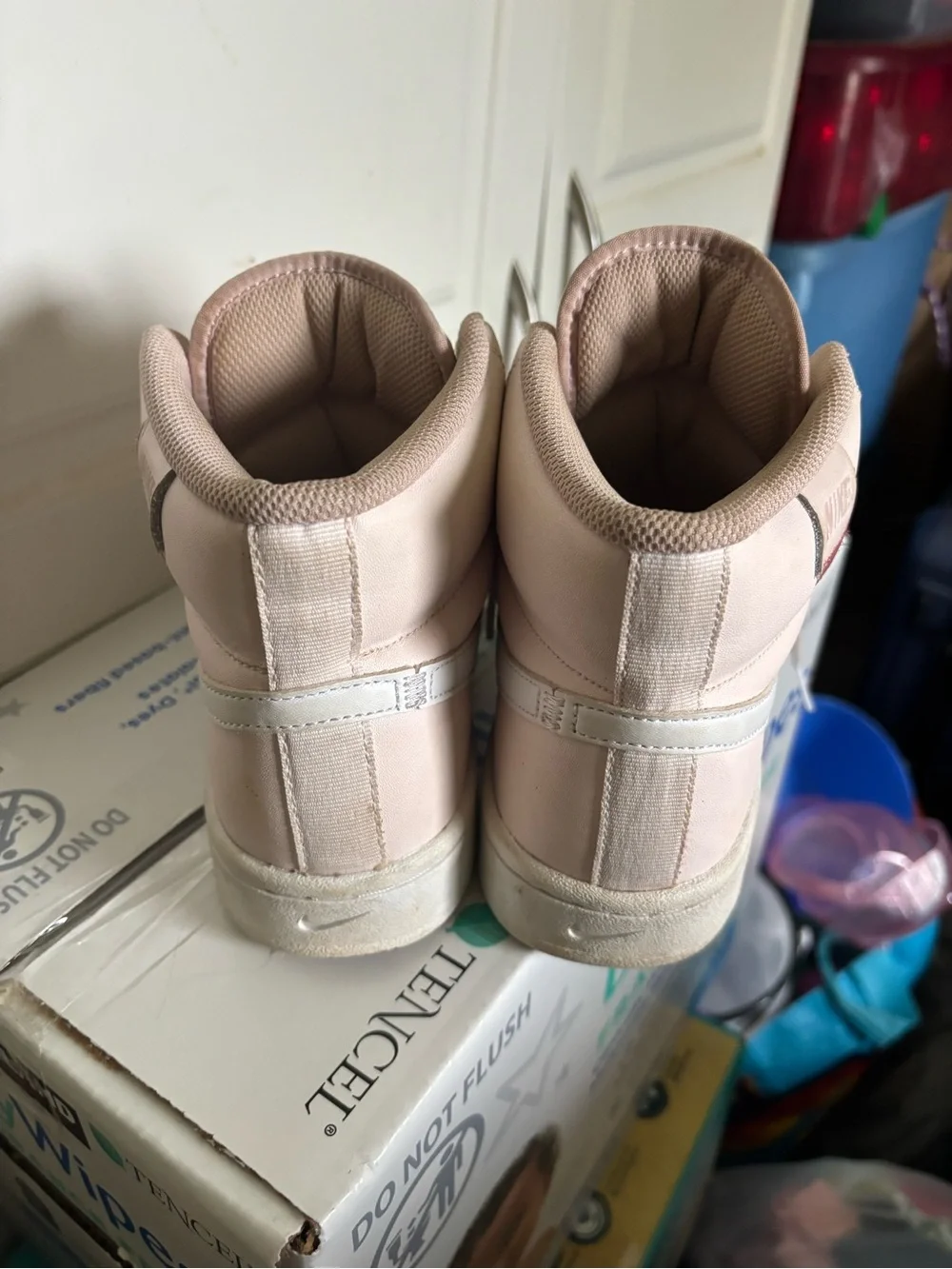 Nike Women's Mid-Top Sneakers in Pale Pink and White